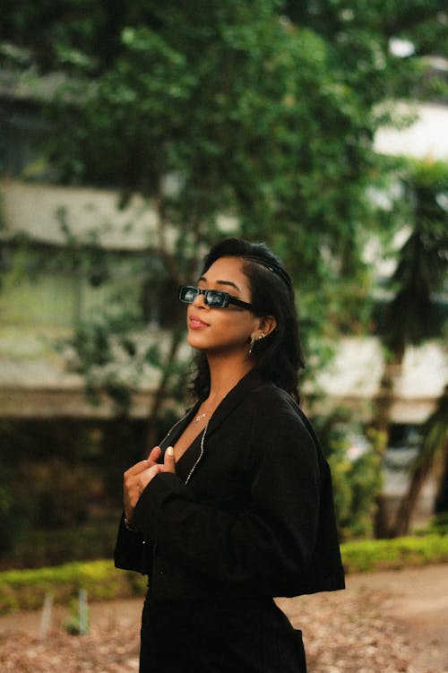 Woman with Sunglasses and Black Clothes