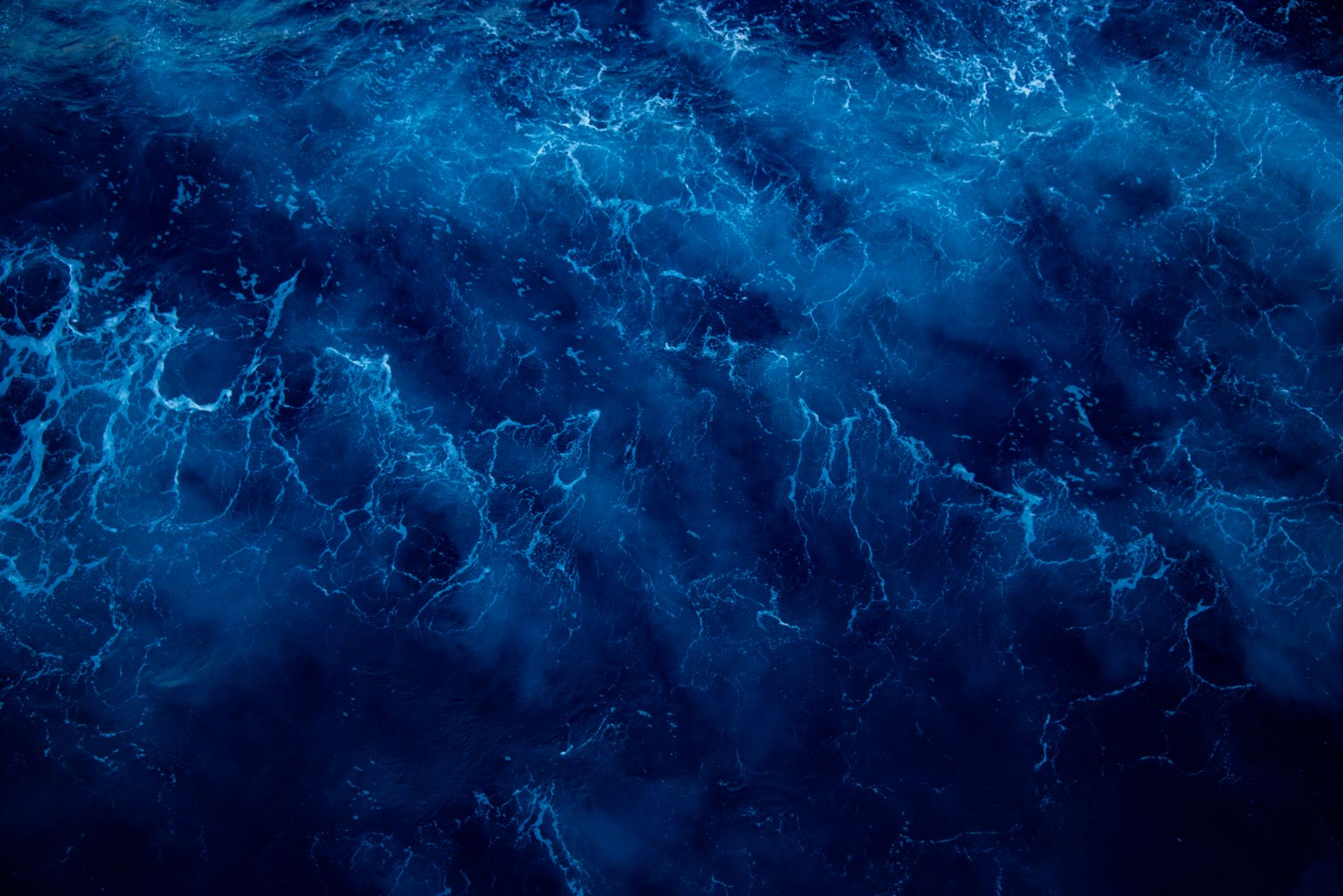 Deep blue ocean seen from above, photo by Diego F. Parra on Pexels