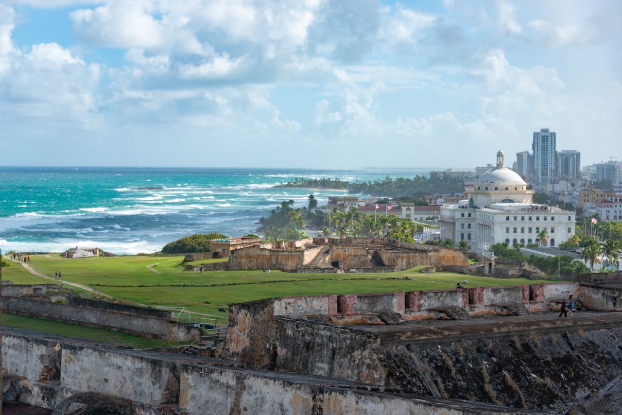 Explore the beautiful coastline and historic El Morro fortress in Old San Juan, Puerto Rico, with city and ocean views.