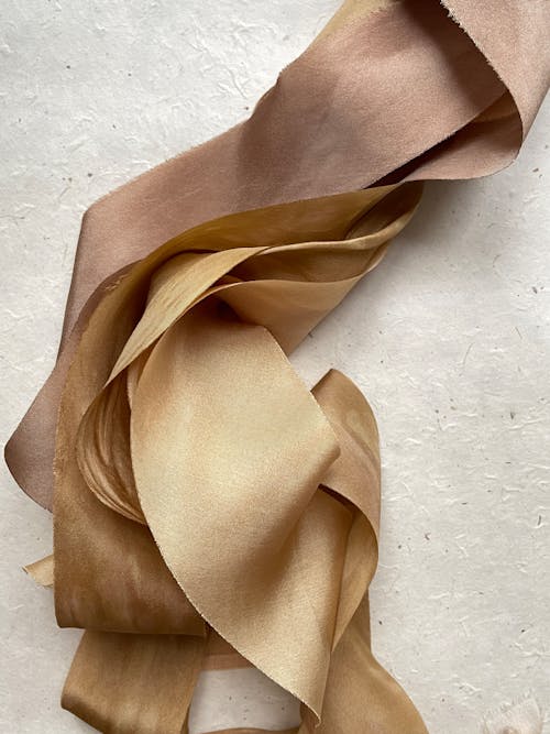 Gold Satin Fabric in Close-up Photography
