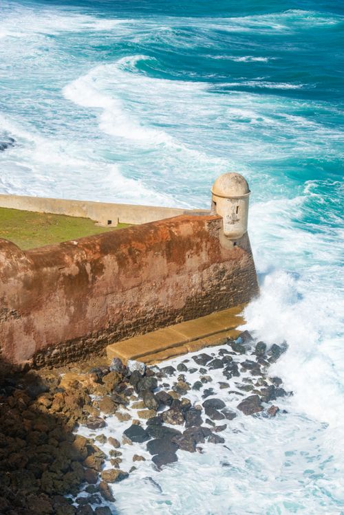 Free Spectacular sea waves crashing against Castillo San Felipe del Morro in Puerto Rico. Stock Photo
