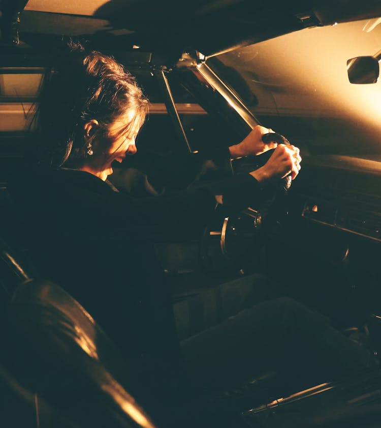 Woman Driving A Car At Night And Shouting 