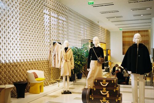 Interior of a modern clothing store with mannequins on display