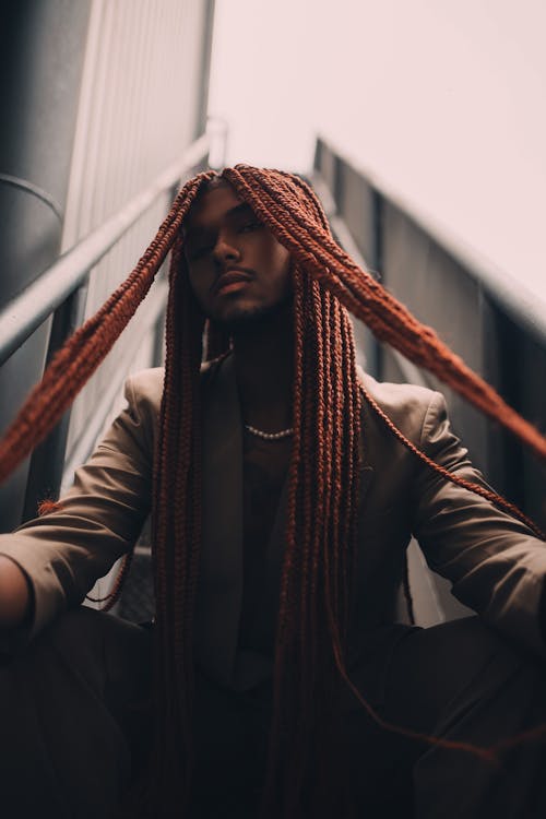 Portrait of a Man with Long Red Dreadlocks 