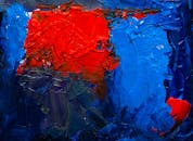 这幅动态抽象画色彩鲜艳，红蓝交织，纹理丰富