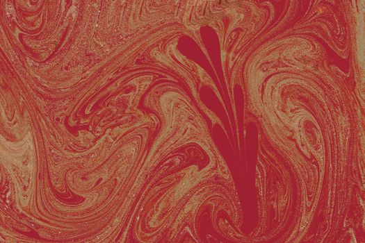 Abstract red and beige marble texture with swirling patterns, perfect for backgrounds or designs.
