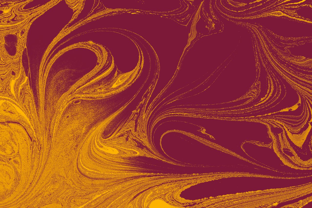 vibrant maroon and yellow swirling marble texture perfect for artistic