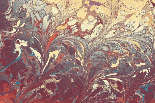 Colorful abstract marbled pattern with flowing shapes and rich textures, perfect for backgrounds and artistic projects.