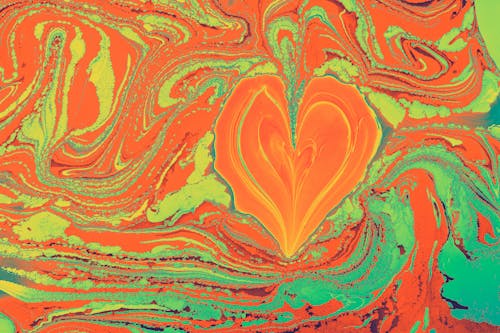 Close-up of an Abstract Painting with a Heart Shape in the Middle 