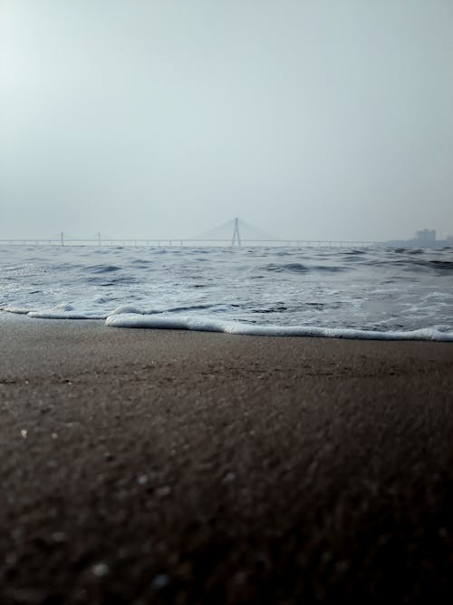 ビーチ, ビーチの波, 垂直ショットの無料の写真素材