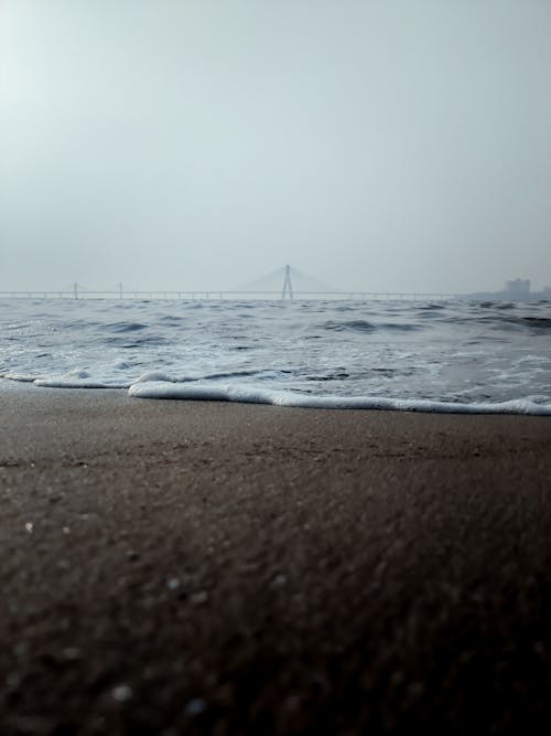 Foto profissional grátis de água, areia, beira-mar