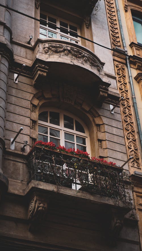 Facade of a Townhouse with Balconies and Arched Windows 