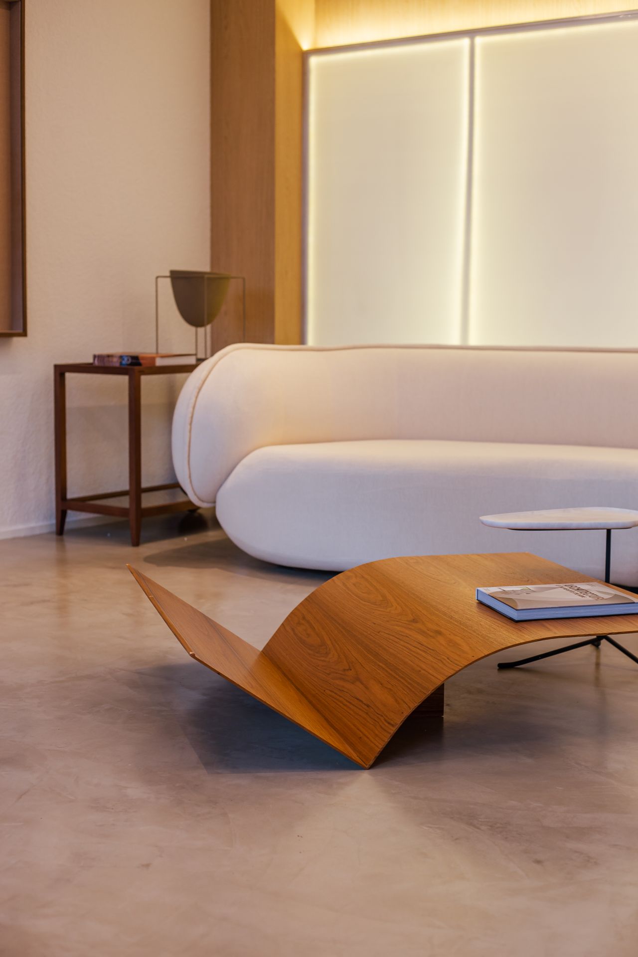 Curved cream sofa in a modern living room