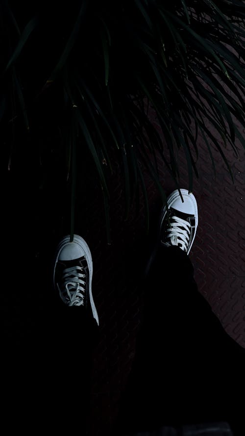 Point of View Photo of Feet Standing by the Lake 