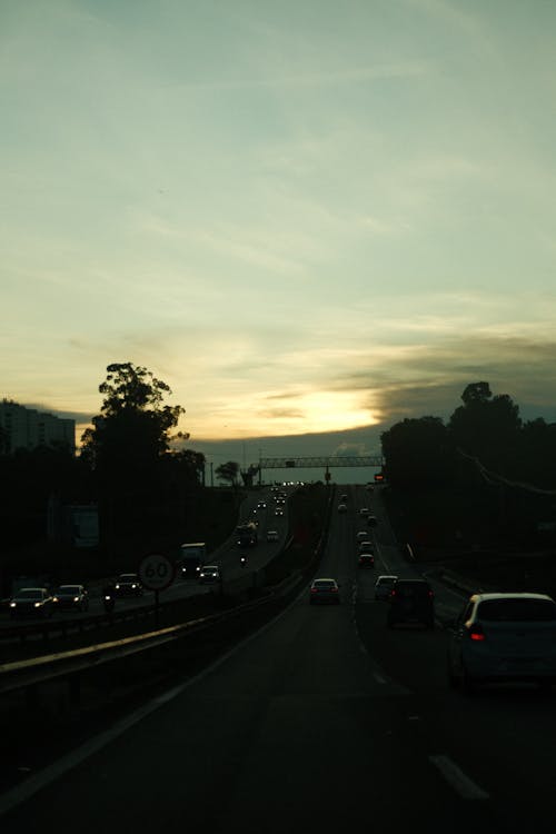 Cars on Highway at Sunset