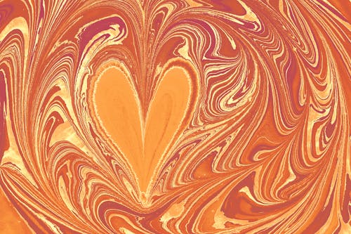 Close-up of an Abstract Painting with a Heart Shape in the Middle 