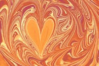 Close-up of an Abstract Painting with a Heart Shape in the Middle