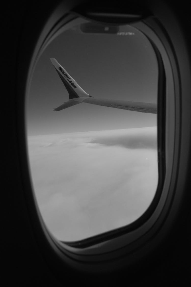 Wing Of Flying Airplane