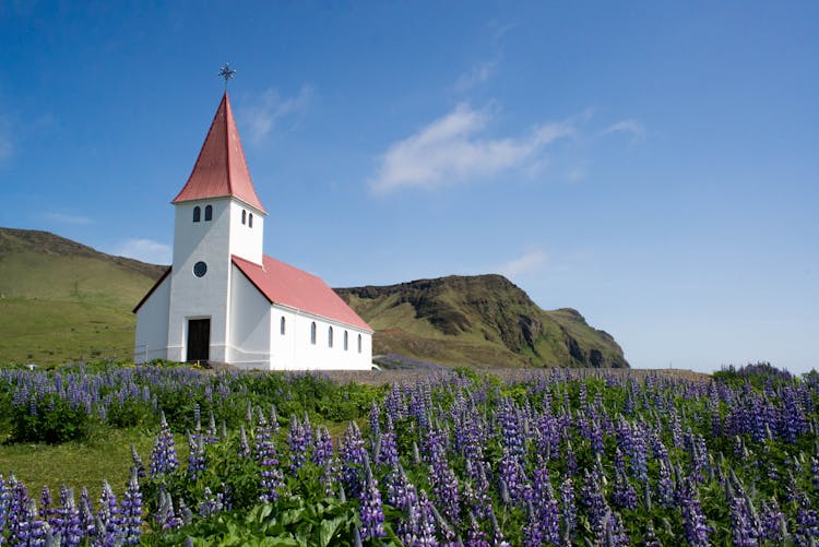 Small Rural Vik And Myrdal Church On Iceland