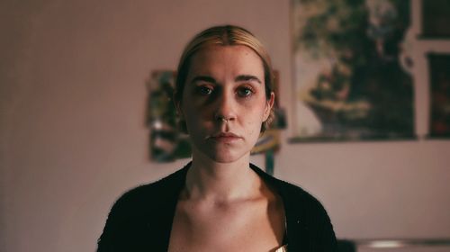 Free Serene portrait of a woman indoors in Sheffield, England captivatingly thoughtful expression. Stock Photo