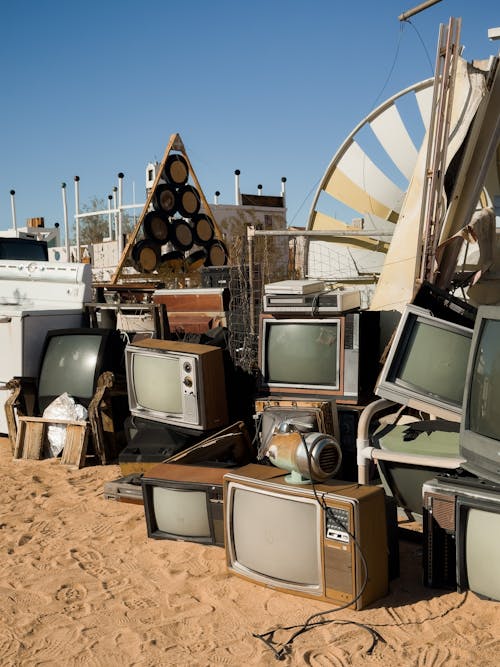 Pile of Old CRT TVs in the Desert Landfill