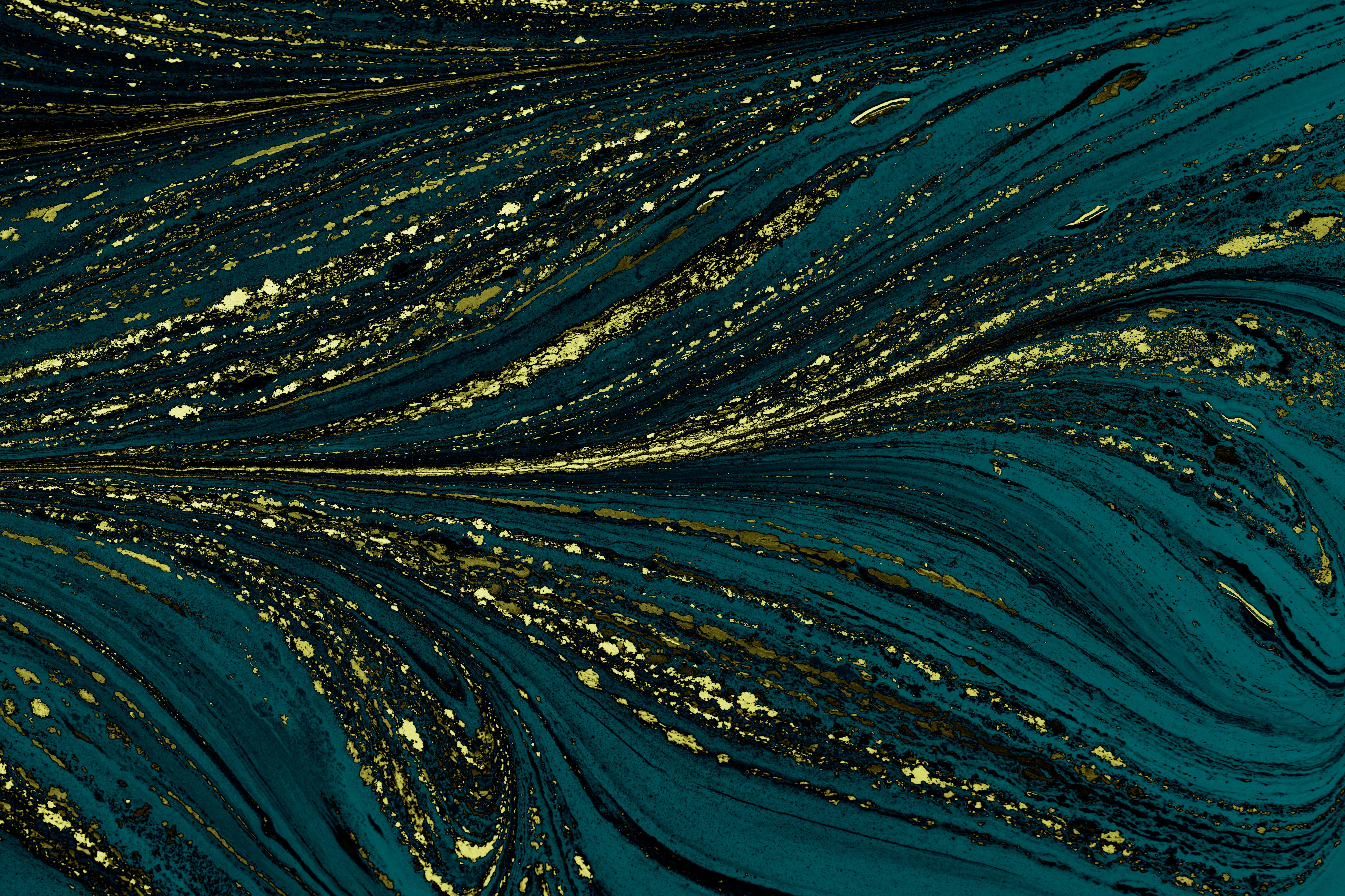 Vivid abstract pattern featuring swirling teal and gold marble textures, perfect for artistic designs.