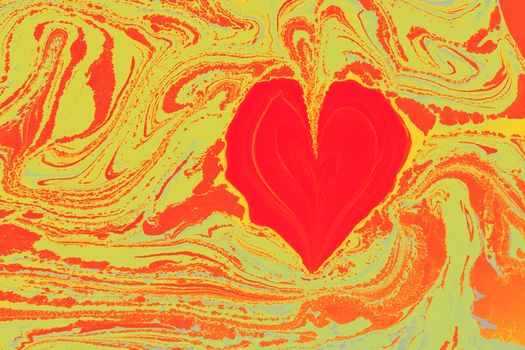 A vibrant red heart shape on a swirling abstract background of orange and yellow hues, symbolizing love.