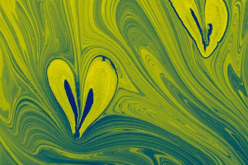 Free Captivating abstract acrylic art with flowing yellow and blue patterns, creating heart shapes. Stock Photo