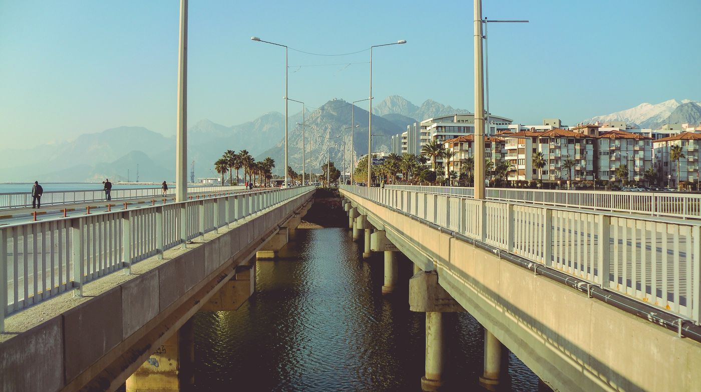 Coastal bridge and waterways beneath a mountain backdrop. Context only; not a VIEWPIECE acquisition or analysis.