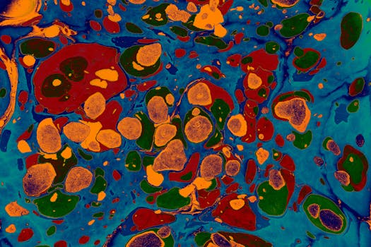 Dynamic abstract fluid art painting with vibrant colors and organic shapes.