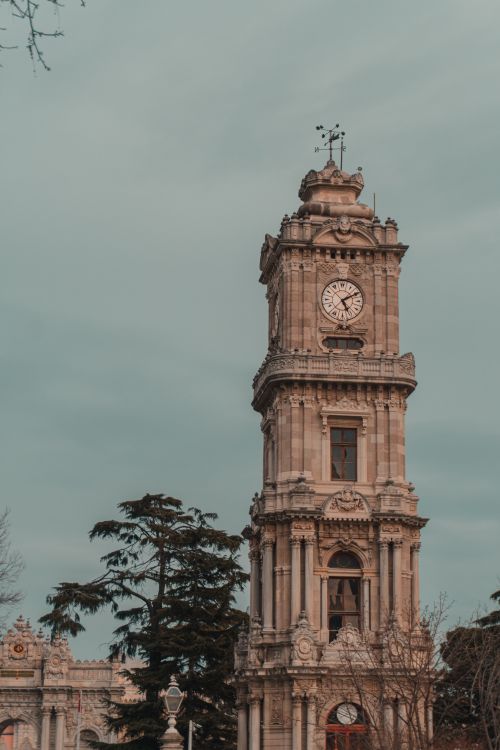 Free Historic Dolmabahçe Clock Tower, a stunning Ottoman landmark in Istanbul, Turkey. Stock Photo