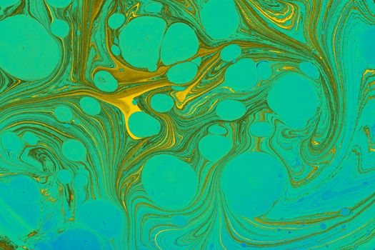 Colorful abstract fluid art featuring turquoise and gold swirling patterns, perfect for modern interiors.