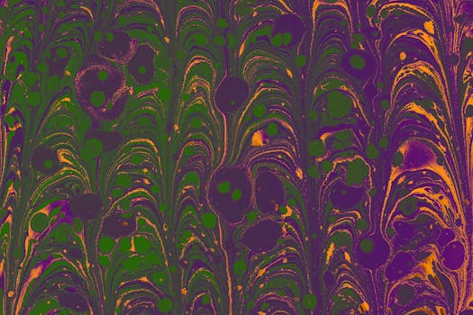Colorful marbled pattern with green, purple, and orange swirls for artistic background.