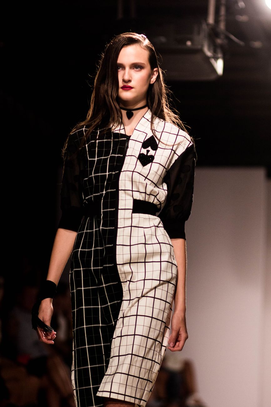 Checked runway dress standing in for the sharper, smaller-room energy of an off-calendar show