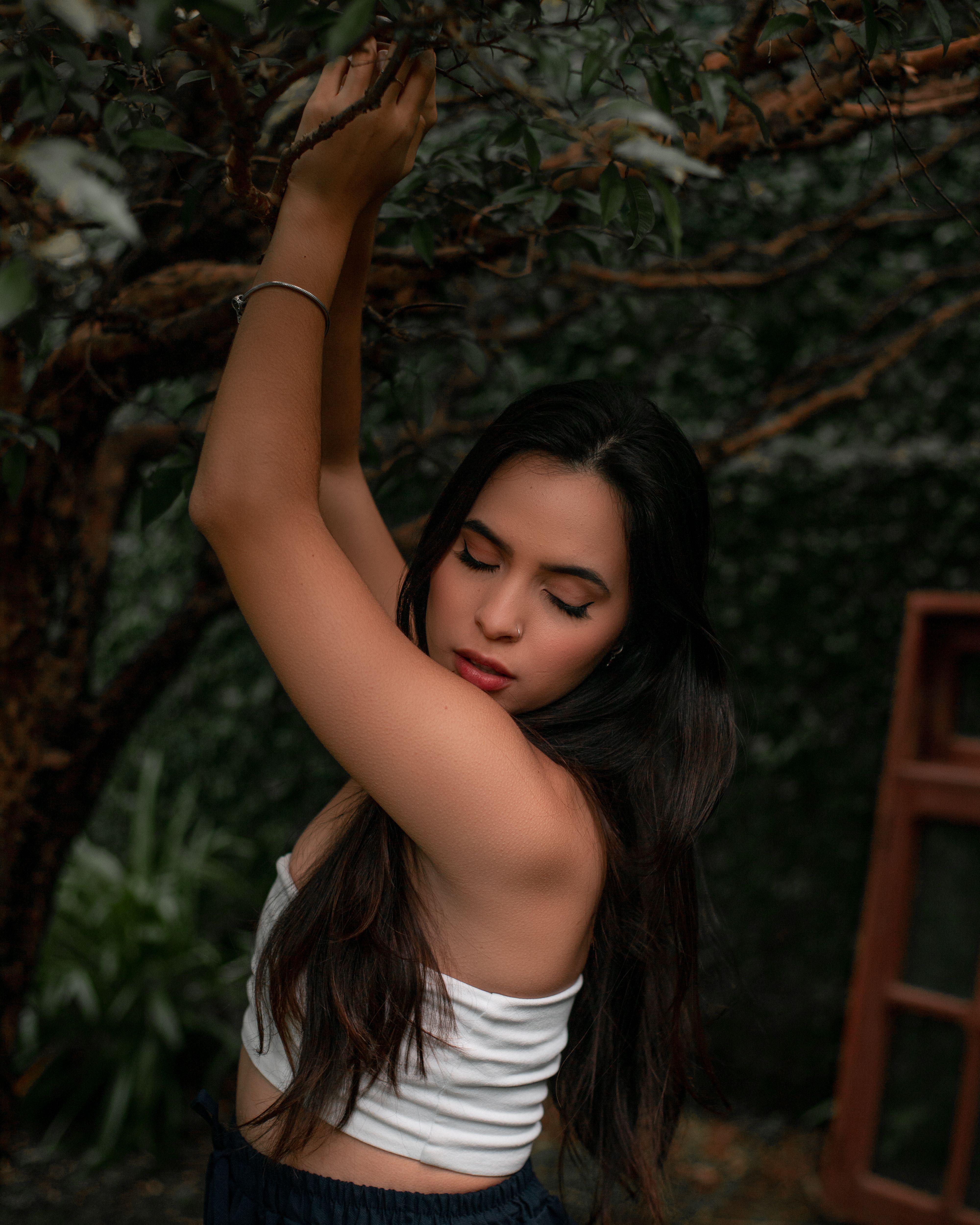 Woman Posing in Darkness · Free Stock Photo