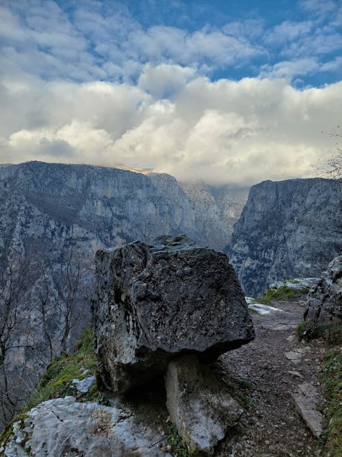 Clouds over Rocks in Mountains