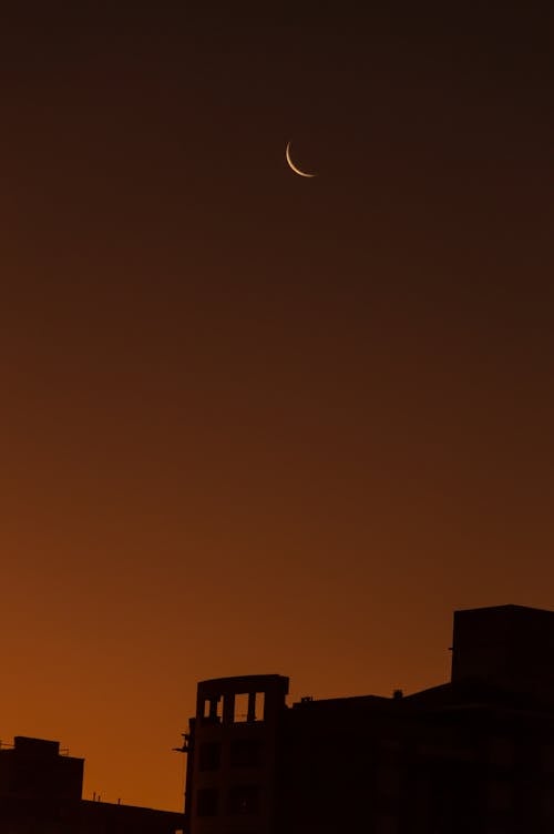 Kostenloses Stock Foto zu gebäude, gelben himmel, klarer himmel