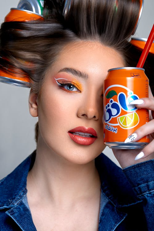 Young Woman Posing with Soda Drink