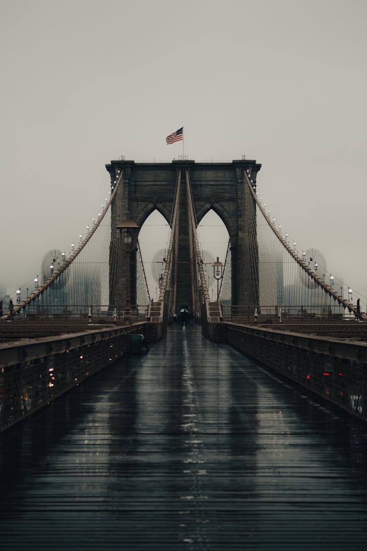 Brooklyn Bridge Under Clouds And After Rain