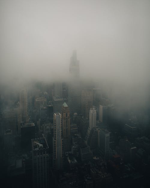 An Aerial Shot of a Foggy City