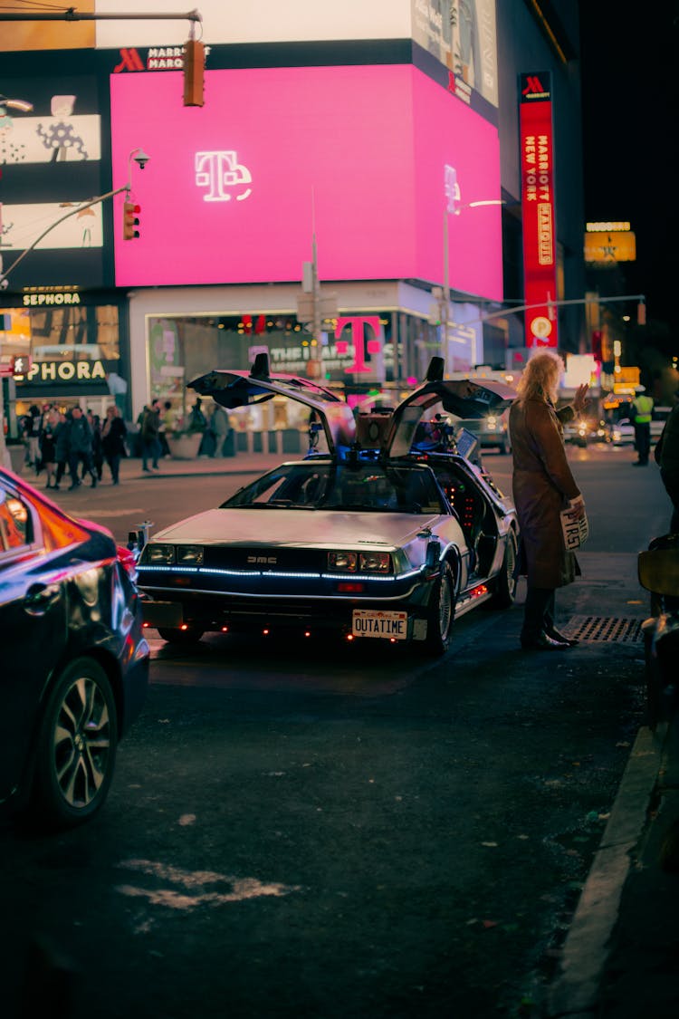 DeLorean DMC On Street At Night