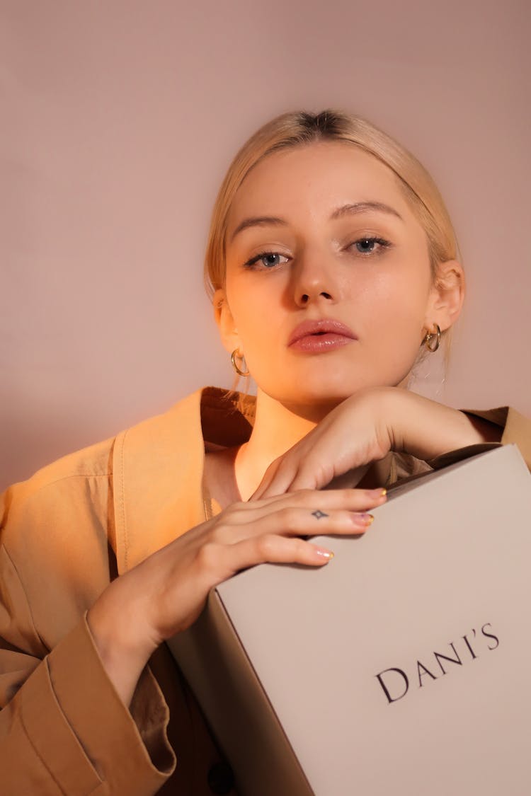 Blonde Woman Posing With Box