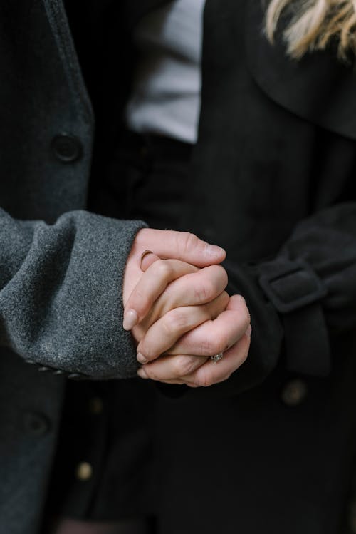 Close-up of Couple Holding Hands