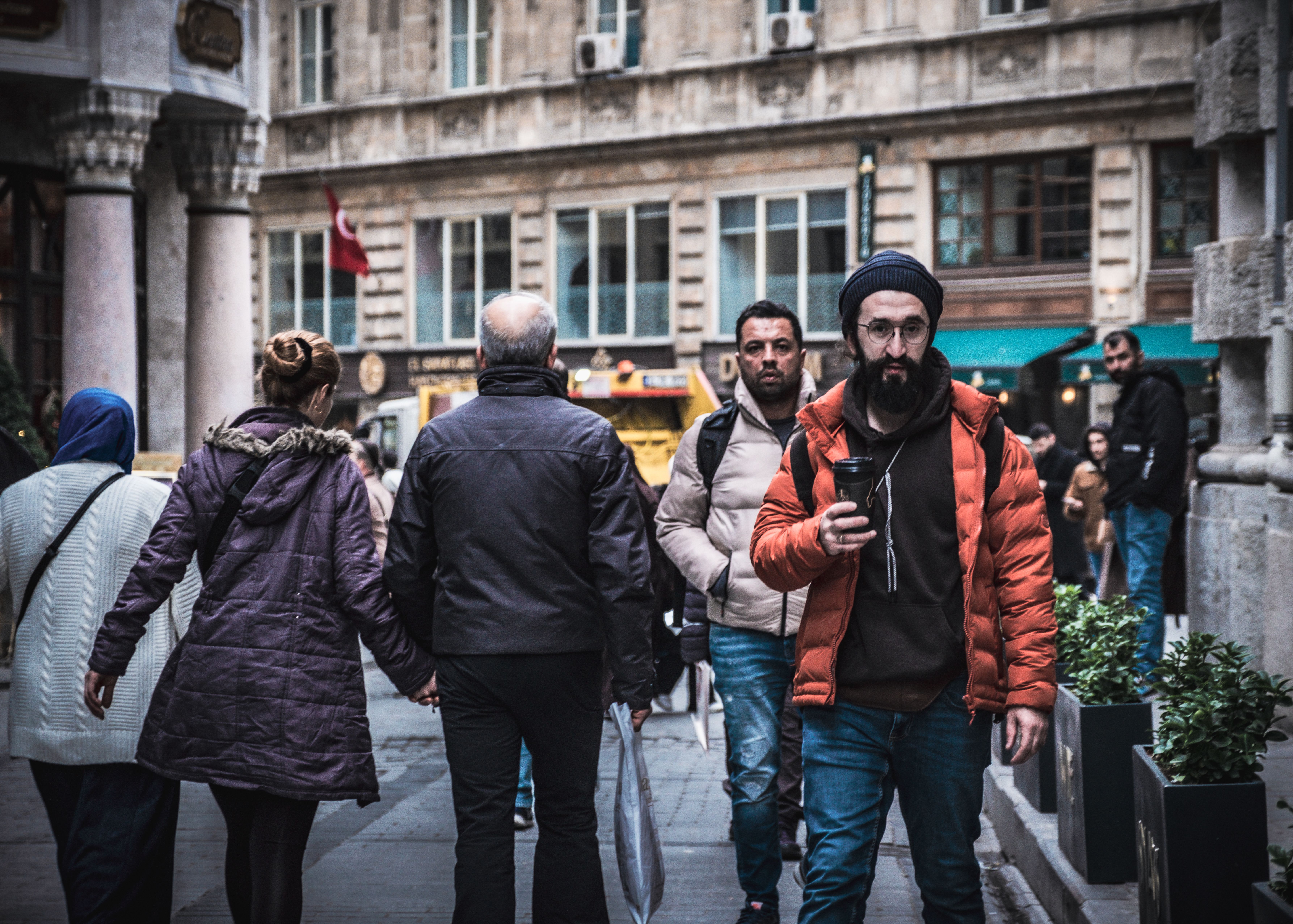 People in Jackets Walking on Sidewalk · Free Stock Photo