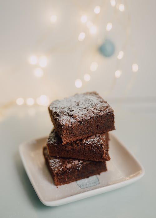 Brown Brownies on White Ceramic Plate