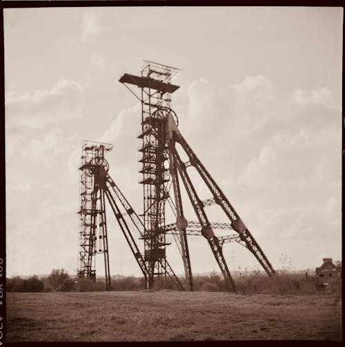 Monochrome Photo of Coal Mine Towers