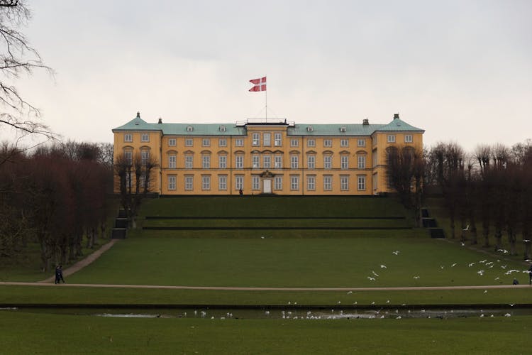 White Birds Flying IN Front Of Frederiksberg Palace