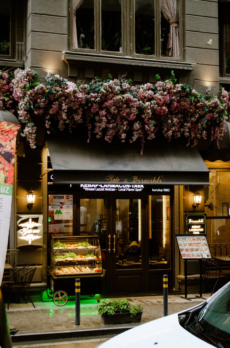 Facade Of A Restaurant In A City 