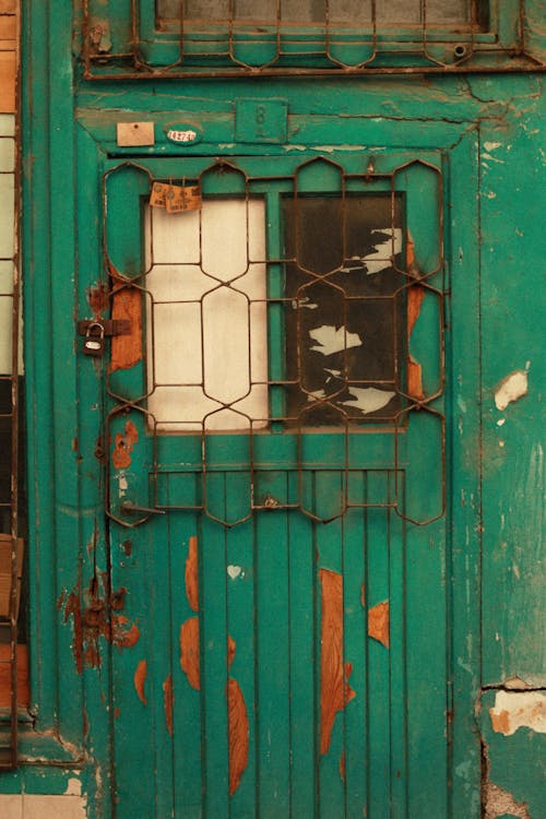 Old Wooden Door with Peeling Paint 