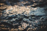 Selective Focus Photography of Body of Water